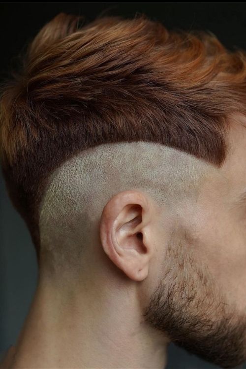 Copper fade undercut with shaved sides and textured top