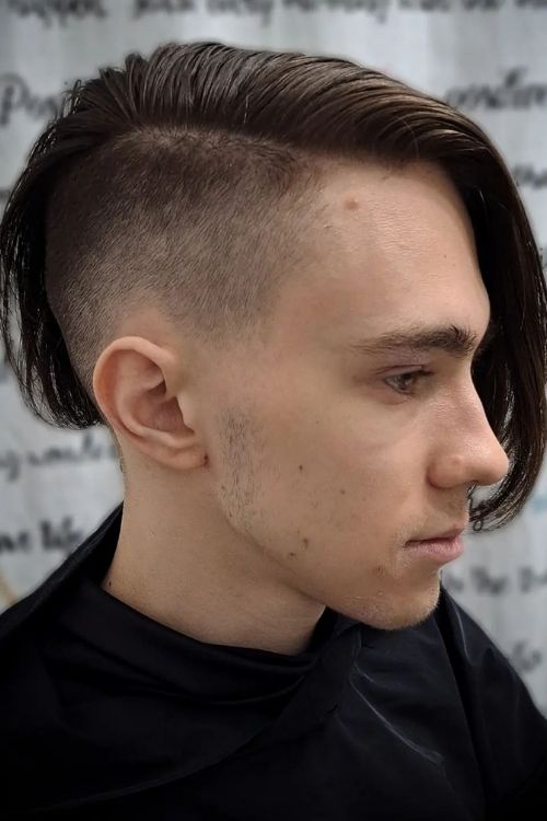 Dark brown long top undercut with shaved sides