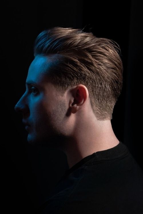 Light brown slicked-back undercut with faded sides