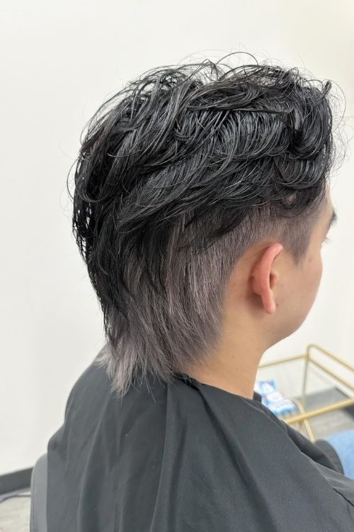 Wet-look mullet with dark roots