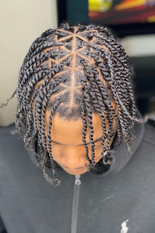  two-strand twists with a central parting neat scalp sections