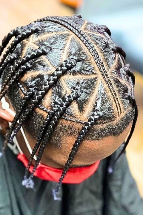  zigzag cornrows with intricate parting and straight-back twists.