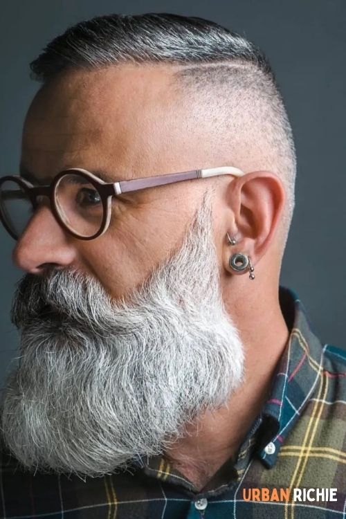 Gray slicked-back fade with beard