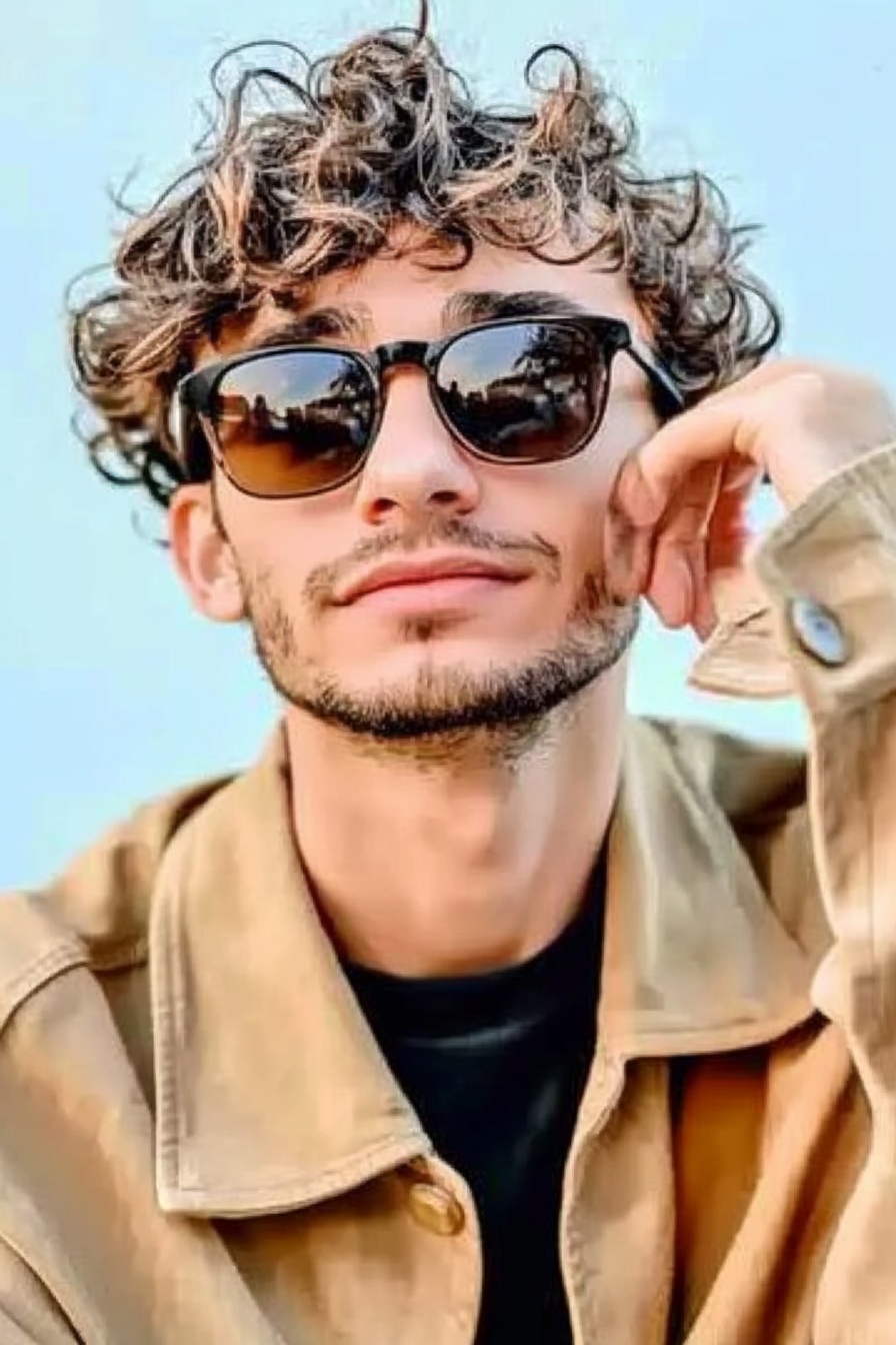 Loose curls with a middle part